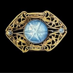Edwardian Filigree Brass Brooch with Blue Star Asterism Czech Sapphire Glass
